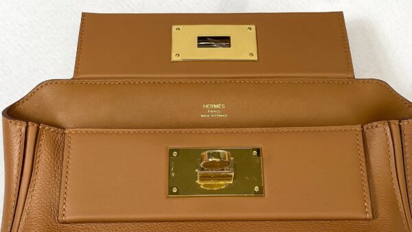 Hermès 24/24 Mini Gold Evercolor Leather with Gold Hardware.