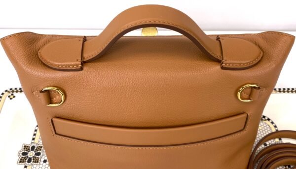 Hermès 24/24 Mini Gold Evercolor Leather with Gold Hardware.