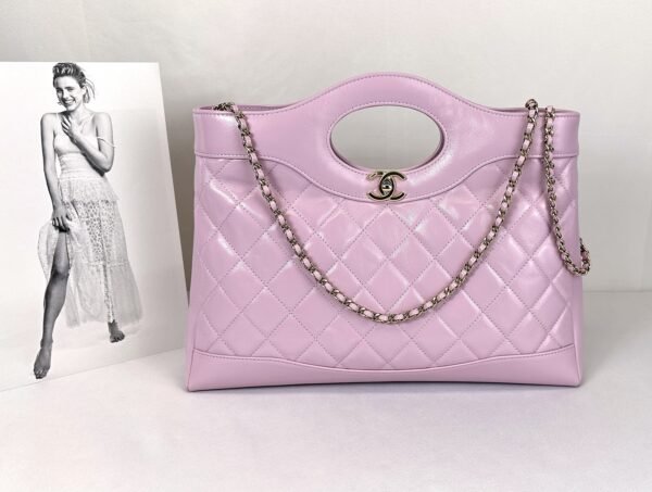 Chanel 24S Light Purple Shiny Lambskin Medium 31 Bag with Champagne Gold Hardware.