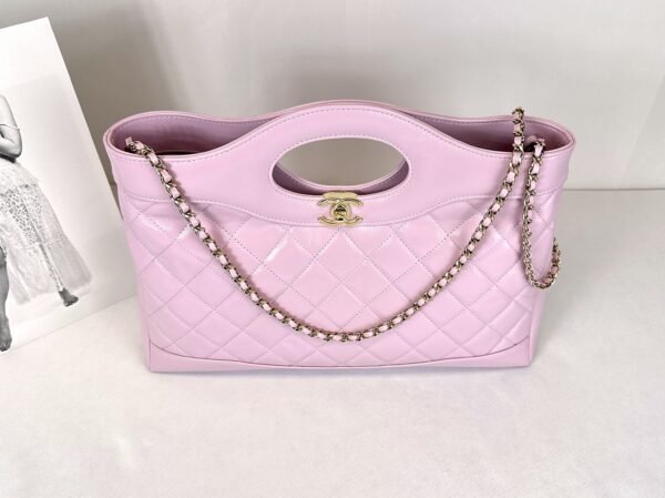 Chanel 24S Light Purple Shiny Lambskin Medium 31 Bag with Champagne Gold Hardware.