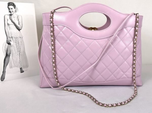 Chanel 24S Light Purple Shiny Lambskin Medium 31 Bag with Champagne Gold Hardware.