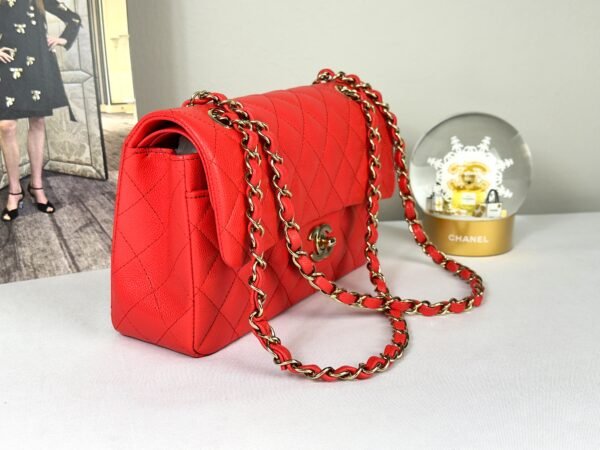 Chanel 25C Red Caviar Small Classic Flap with Light Gold Hardware.