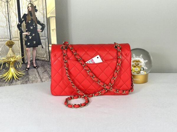 Chanel 25C Red Caviar Small Classic Flap with Light Gold Hardware.