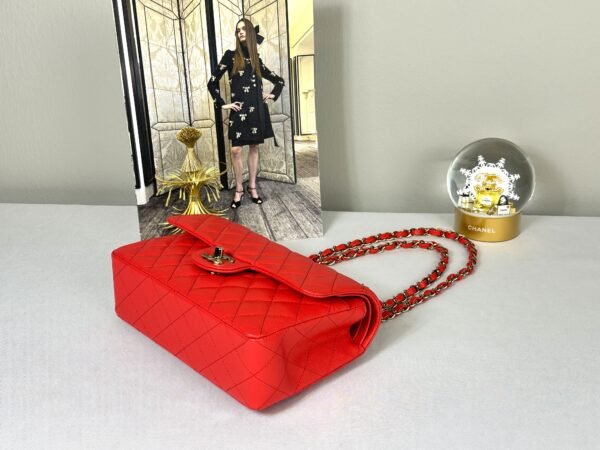 Chanel 25C Red Caviar Small Classic Flap with Light Gold Hardware.