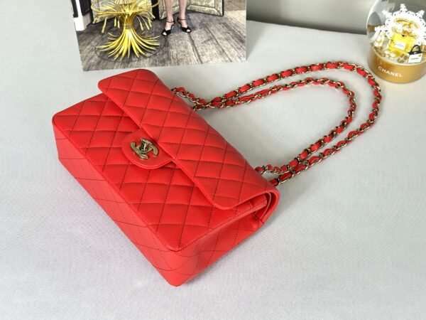 Chanel 25C Red Caviar Small Classic Flap with Light Gold Hardware.